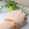 Pulseira de Calcita Laranja 6mm - Energia Solar e Criatividade
