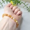 Pulseira de Calcita Laranja 6mm - Energia Solar e Criatividade