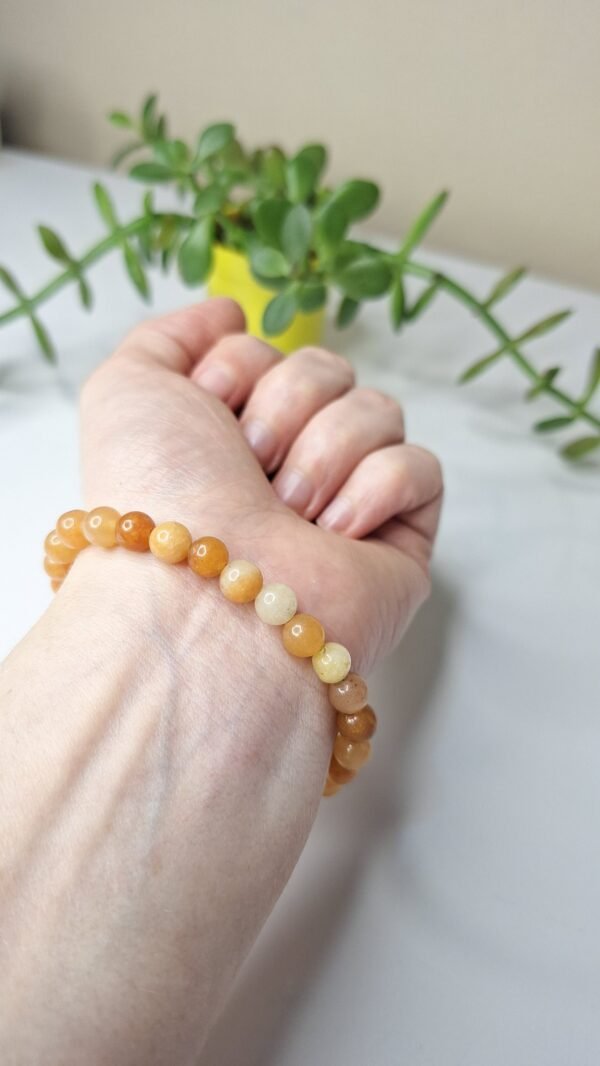 Pulseira de Calcita Laranja 6mm - Energia Solar e Criatividade