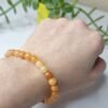 Pulseira de Calcita Laranja 6mm - Energia Solar e Criatividade