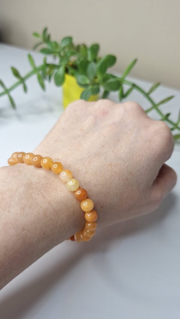 Pulseira de Calcita Laranja 6mm - Energia Solar e Criatividade