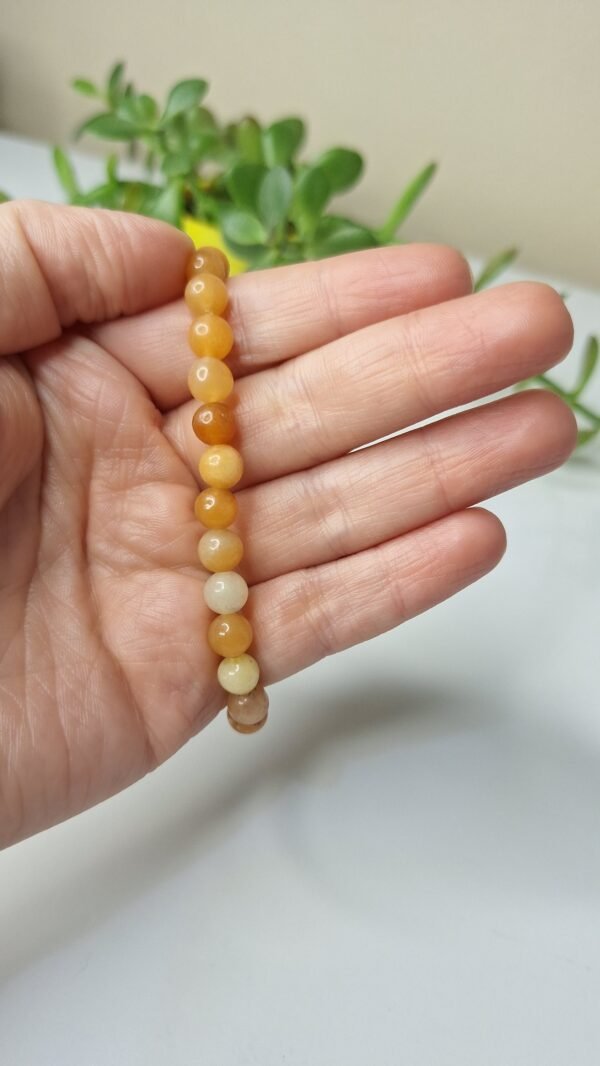 Pulseira de Calcita Laranja 6mm - Energia Solar e Criatividade